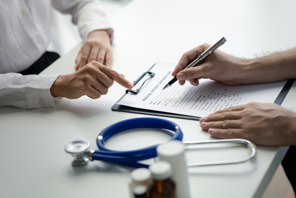Doctors,Are,Giving,Advice,On,Treatment,To,Patients,In,Hospital Internist Hietzing - Dr. Marcus Franz